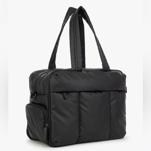 Brand new in box. Will add more photos soon or actual bag.